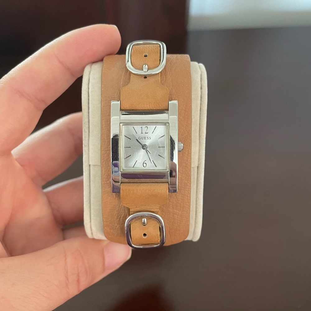 Guess watch. Tan leather. Silver watch face and buckle.